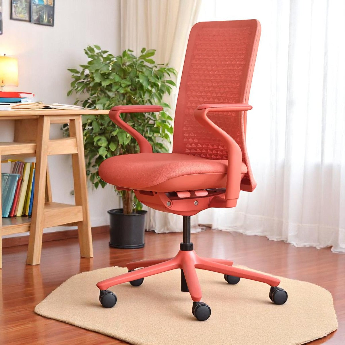 Model 92 coral ergonomic office chair in a home office, comfortable and adjustable design
